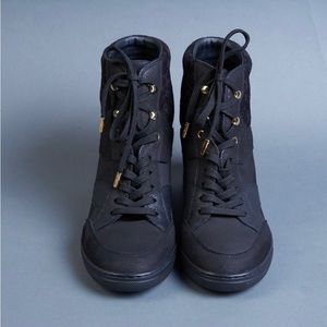 LOUIS VUITTON
High Top Wedge Sneakers
